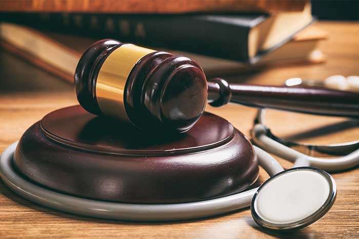 gavel with stethoscope