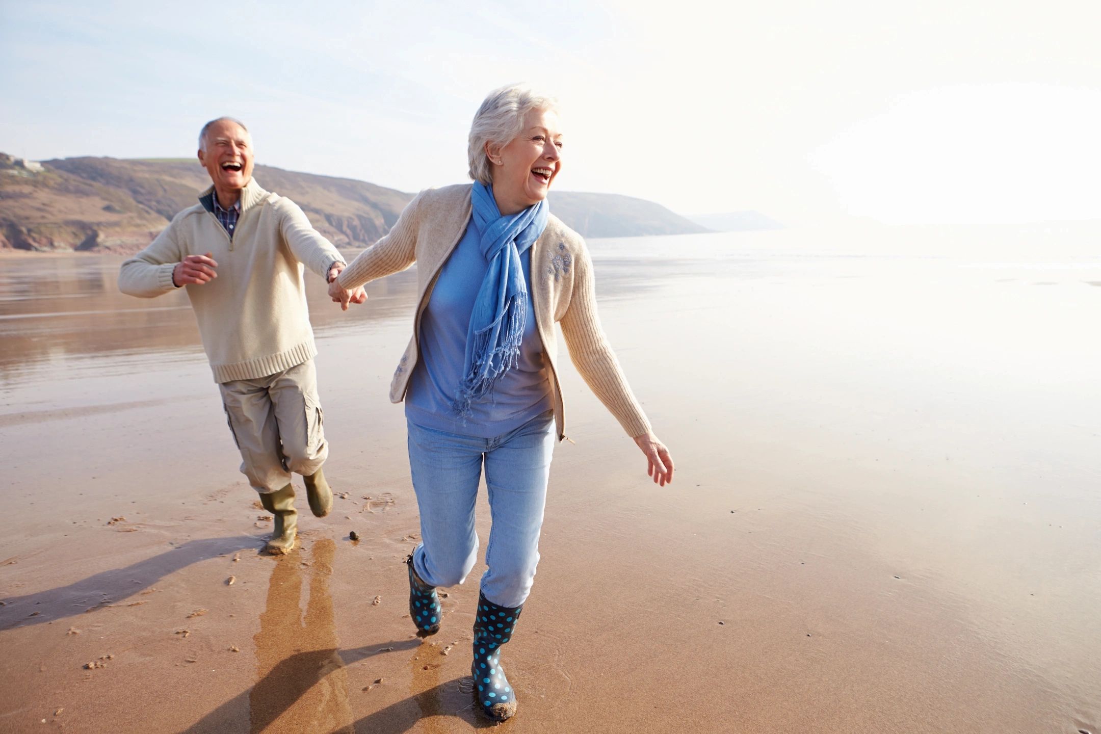 elderly couple on beach