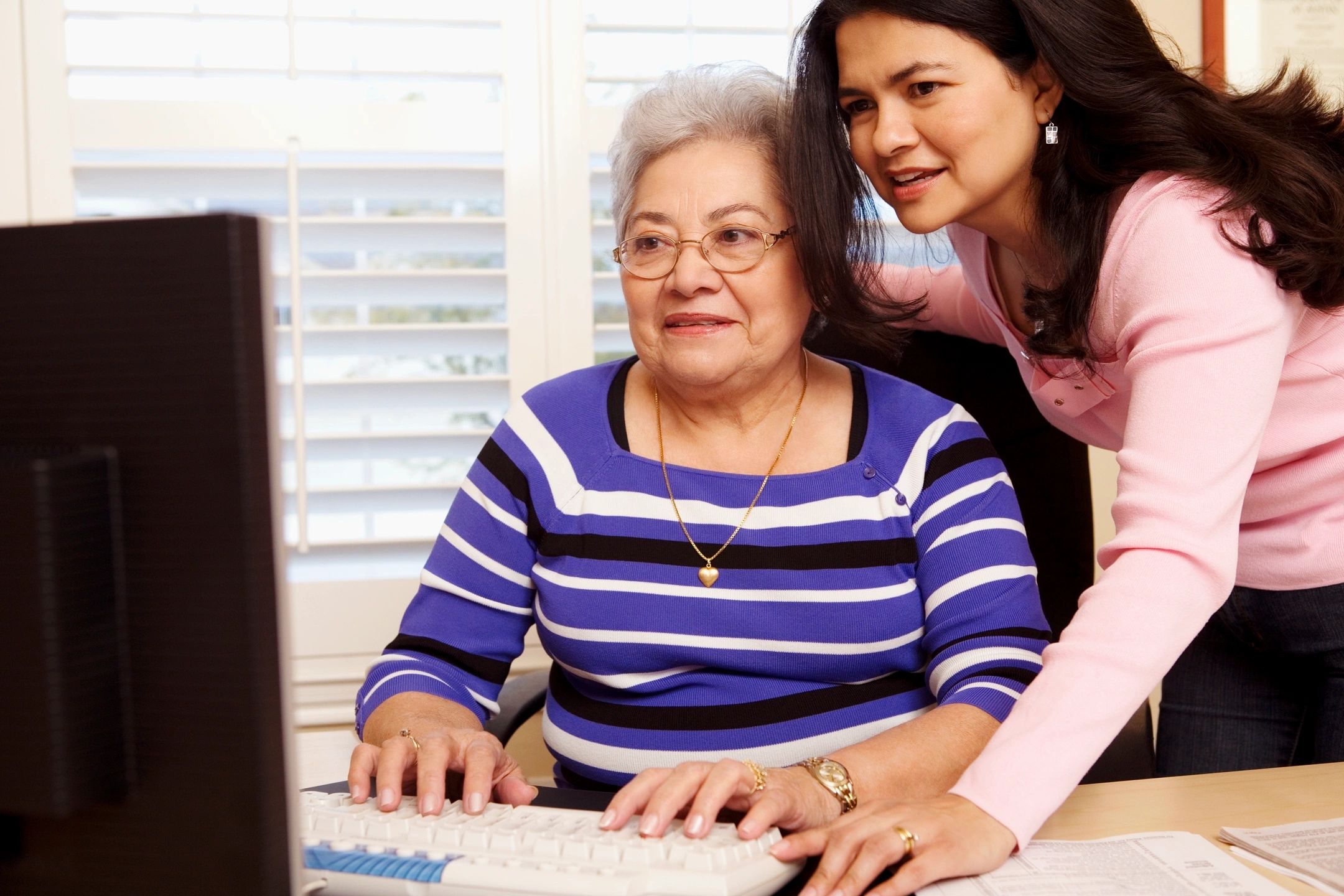 helping elderly woman