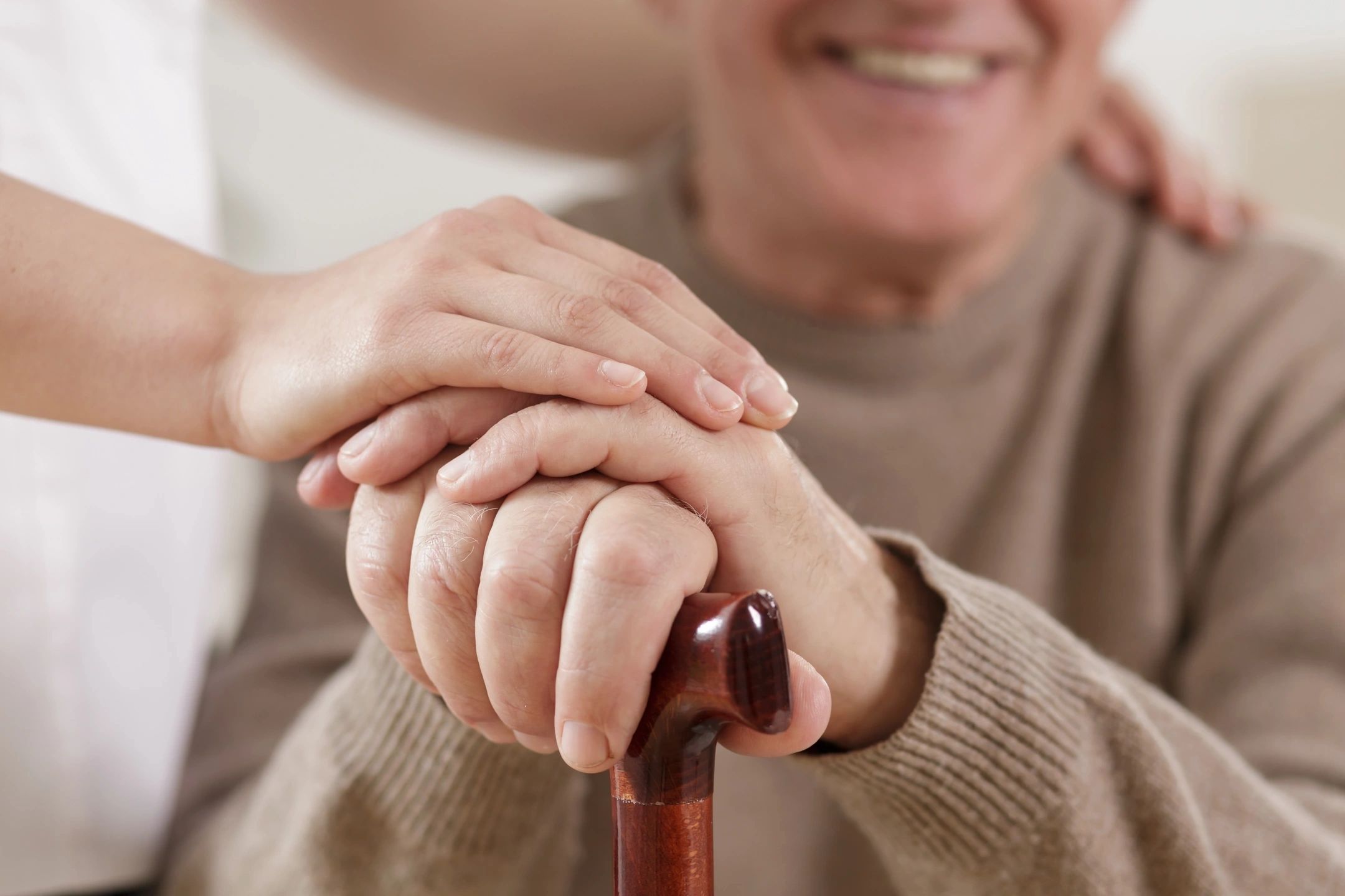 elderly person with cane