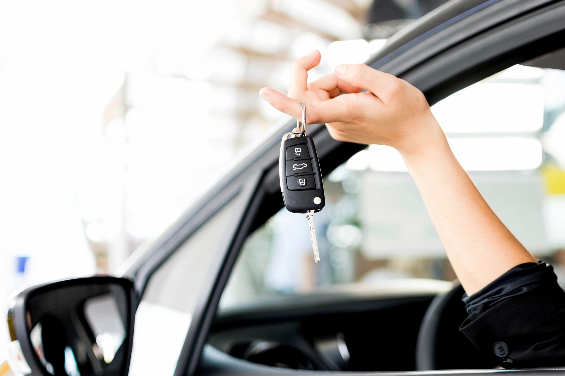dangling car keys out of window